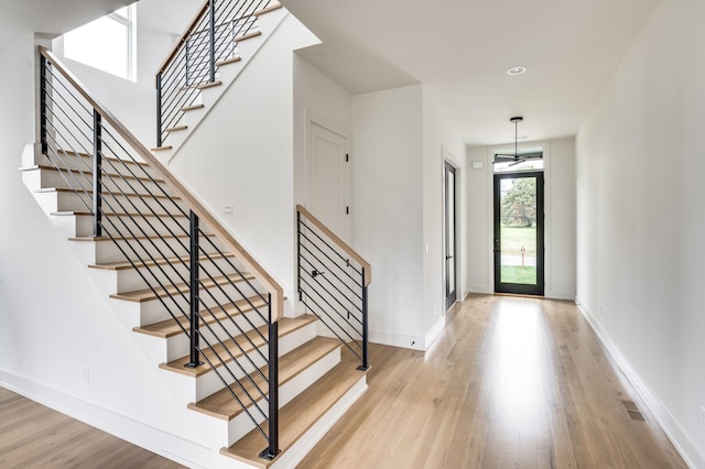 entryway with light hardwood / wood-style flooring