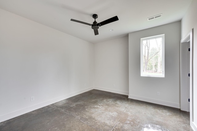 unfurnished room with concrete floors and ceiling fan