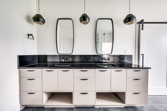 bathroom with vanity and tile patterned floors