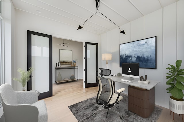 office area featuring french doors and light hardwood / wood-style floors