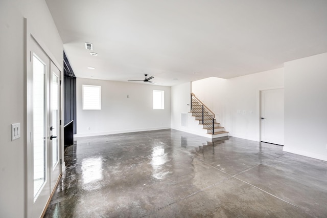 unfurnished room with ceiling fan