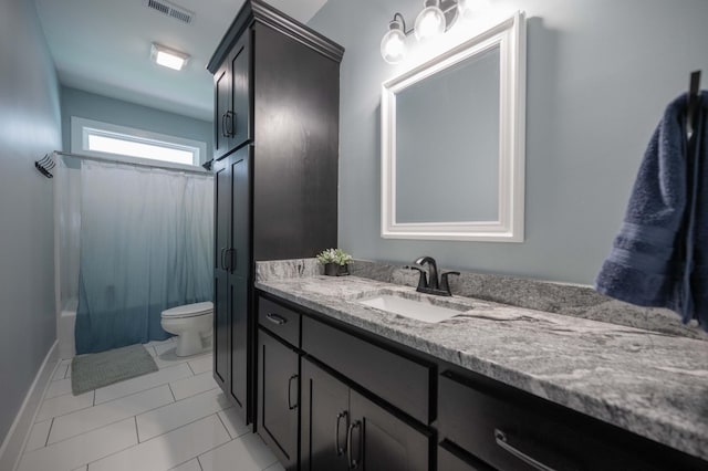 full bathroom featuring tile patterned flooring, shower / bath combination with curtain, vanity, and toilet