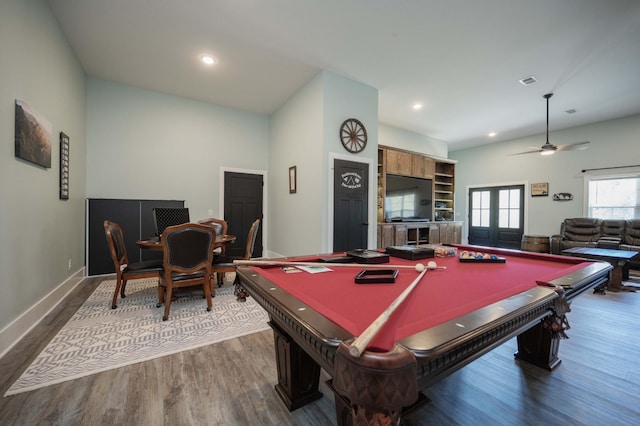 game room with dark hardwood / wood-style floors, ceiling fan, pool table, and french doors