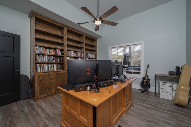 office area with ceiling fan and dark hardwood / wood-style flooring