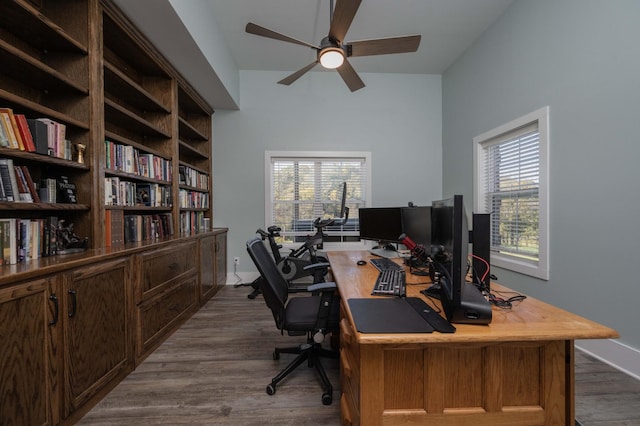 office area with ceiling fan and hardwood / wood-style floors