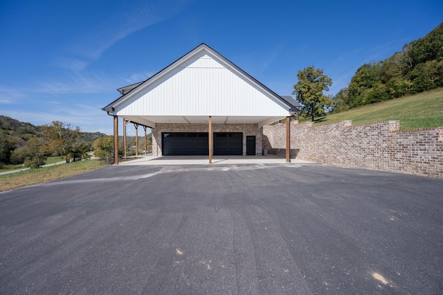 exterior space with a carport