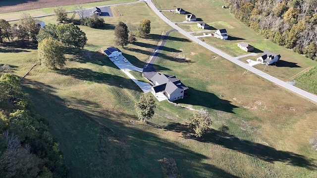 birds eye view of property featuring a rural view