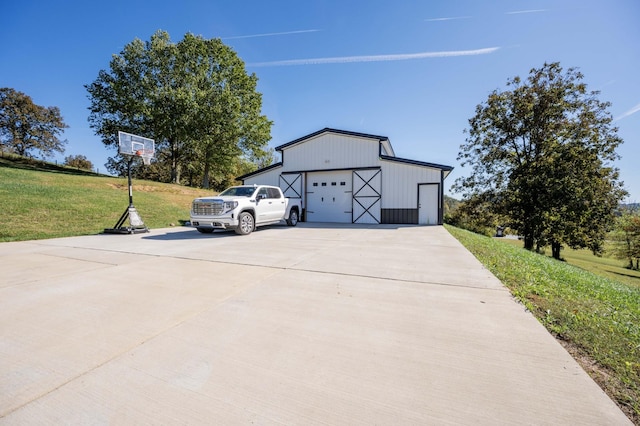 garage with a yard