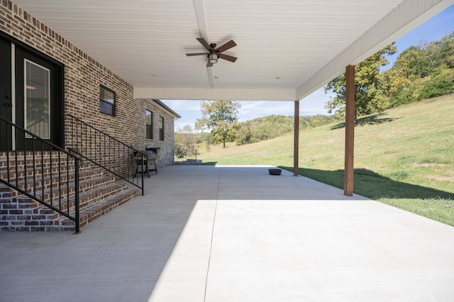 view of patio / terrace featuring ceiling fan