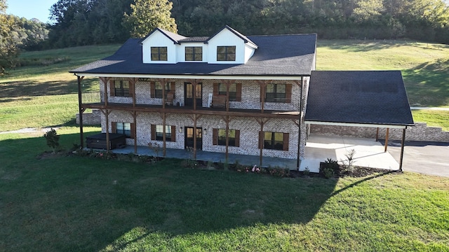 view of front of property with a front lawn and a patio area