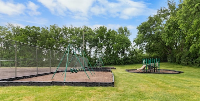 view of jungle gym featuring a lawn