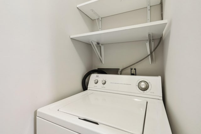 washroom with washer / clothes dryer