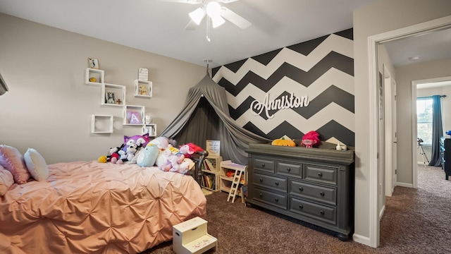 bedroom featuring dark colored carpet and ceiling fan