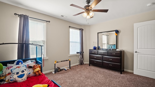 bedroom featuring ceiling fan and carpet floors