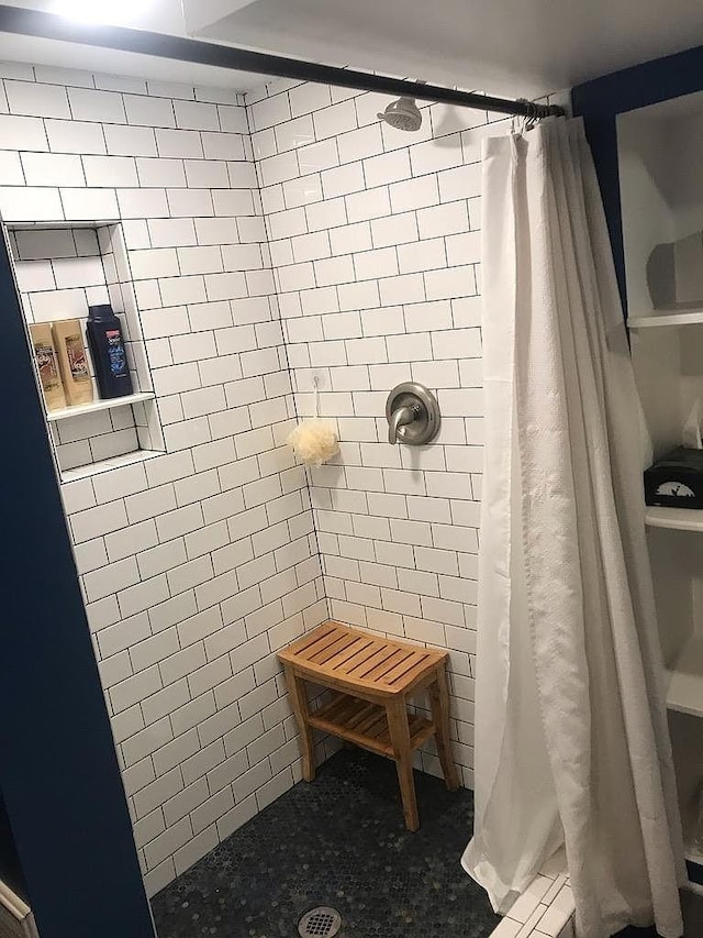 bathroom featuring walk in shower