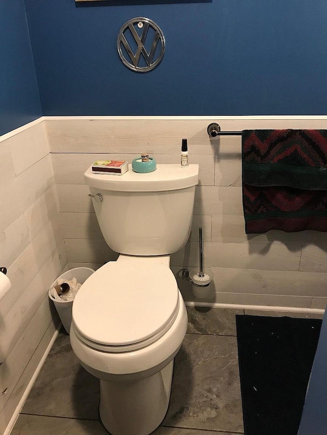 bathroom with tile patterned floors and toilet