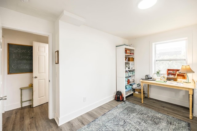 office with dark wood-type flooring