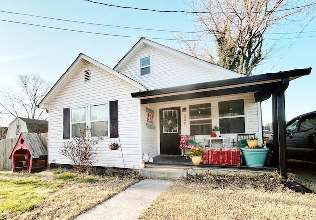 bungalow-style house featuring covered porch