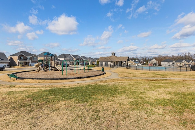 view of jungle gym with a lawn