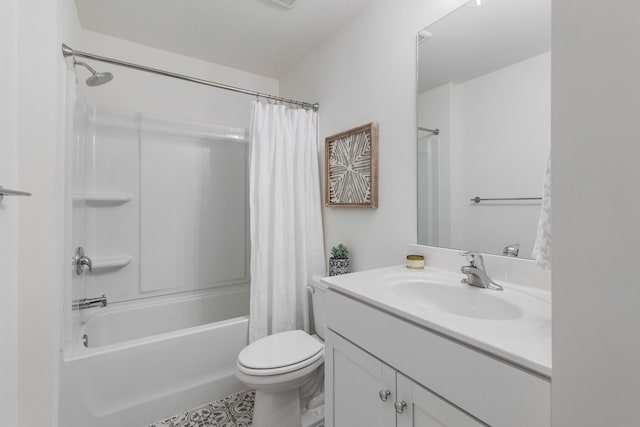 full bathroom featuring vanity, shower / tub combo, and toilet