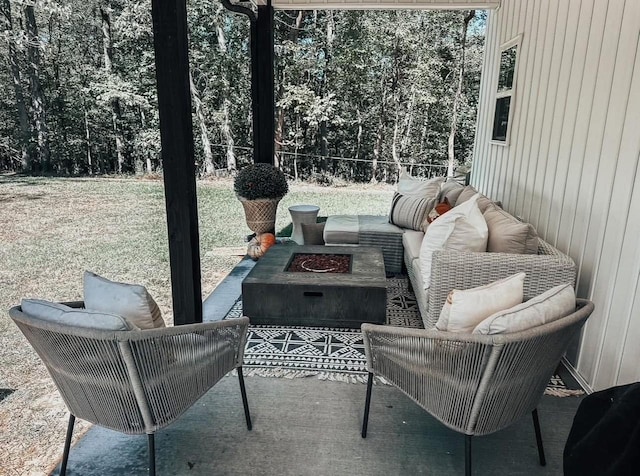 view of patio / terrace with a fire pit