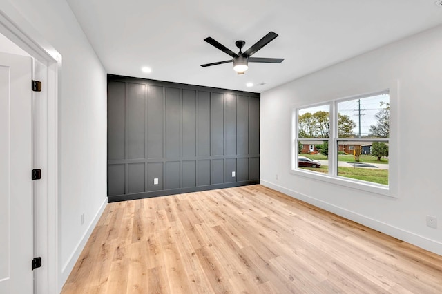 interior space featuring light hardwood / wood-style floors and ceiling fan