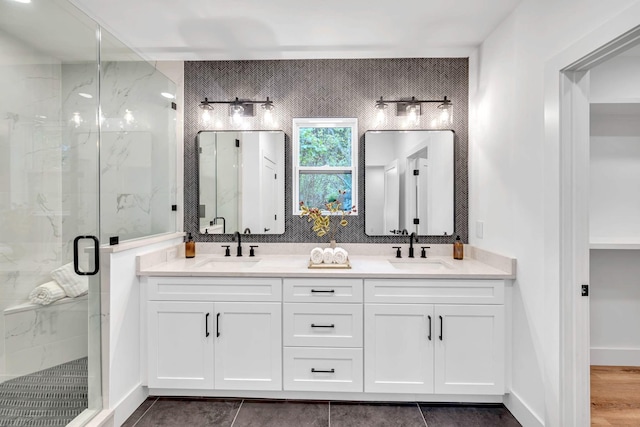 bathroom with vanity and walk in shower