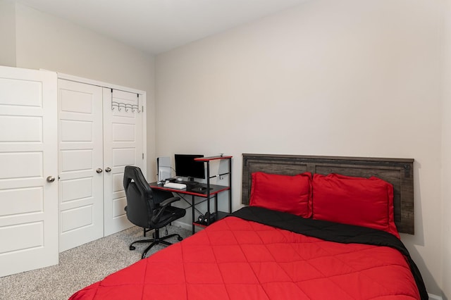 carpeted bedroom with a closet