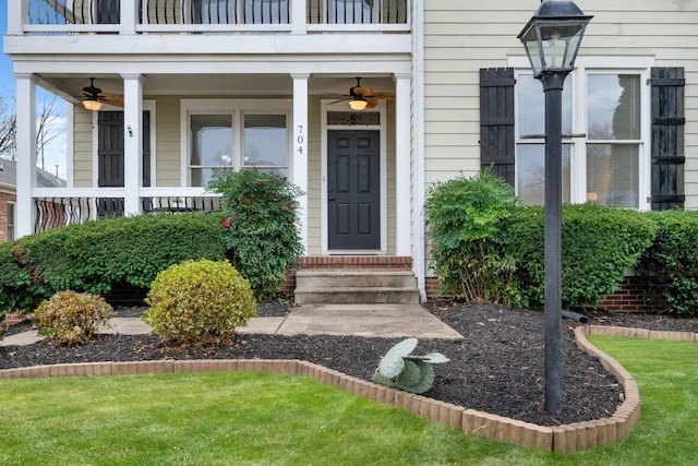 doorway to property featuring ceiling fan and a balcony