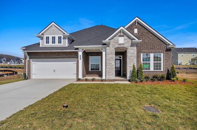 craftsman house with a front lawn and a garage