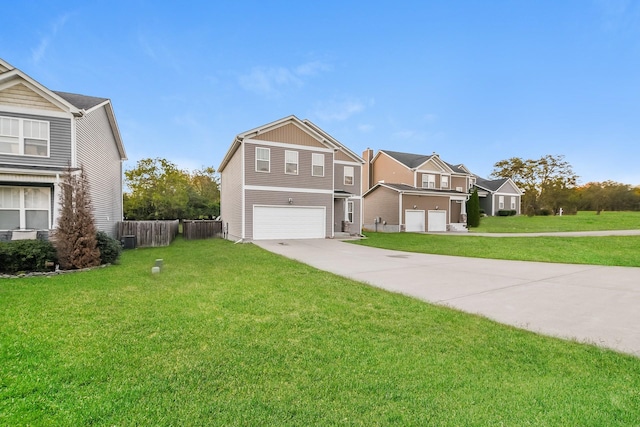 view of front of house with a garage and a front yard