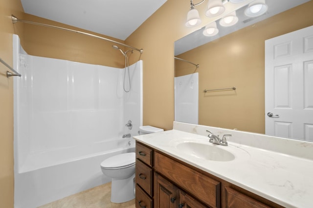 full bathroom with shower / bathing tub combination, tile patterned flooring, vanity, and toilet