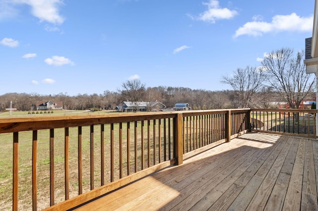 wooden deck with a yard