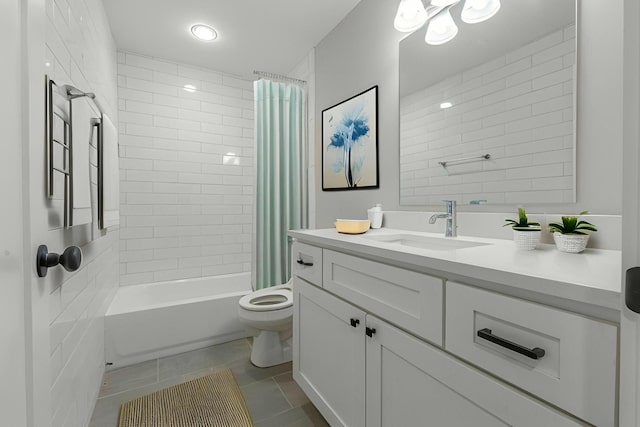 full bathroom featuring tile patterned floors, vanity, toilet, and shower / bathtub combination with curtain