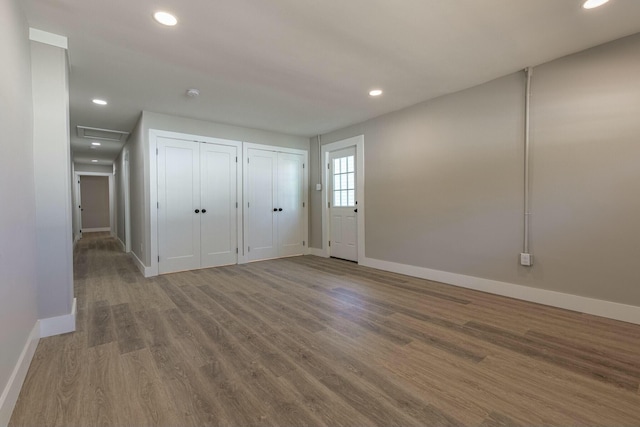 entrance foyer featuring hardwood / wood-style flooring