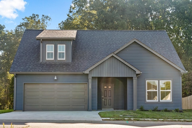 view of front of home with a garage