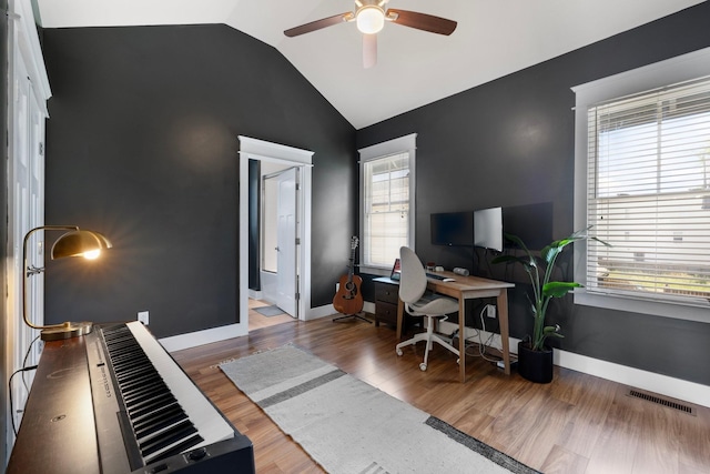 office area featuring hardwood / wood-style flooring, ceiling fan, and a healthy amount of sunlight