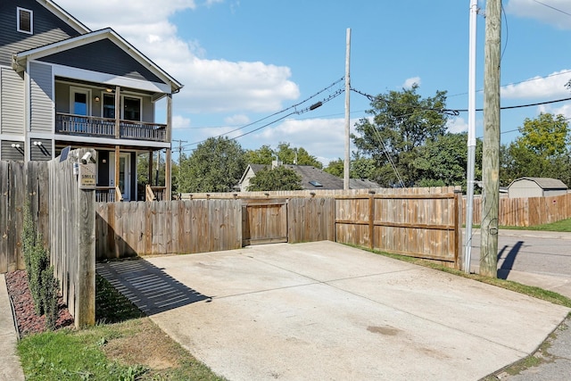 view of patio featuring a balcony