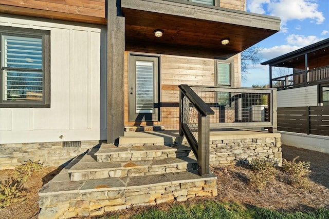 property entrance featuring covered porch