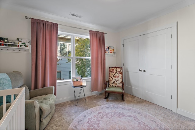 sitting room with light colored carpet