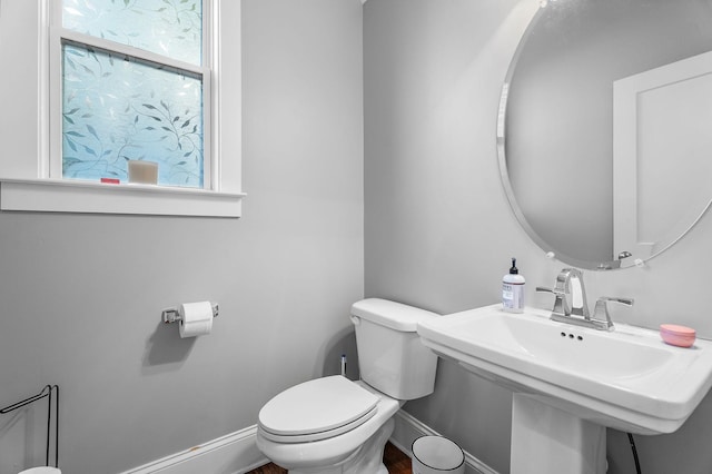 bathroom with sink and toilet