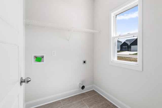 laundry area with electric dryer hookup and hookup for a washing machine