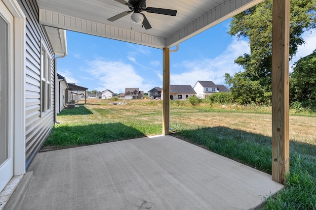 view of patio featuring ceiling fan