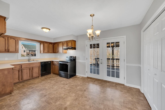 kitchen with sink, an inviting chandelier, black dishwasher, pendant lighting, and stainless steel electric stove