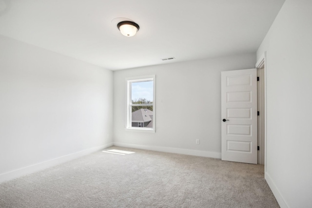 unfurnished room with carpet