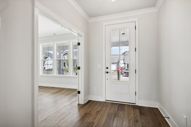 entrance foyer with hardwood / wood-style flooring and crown molding