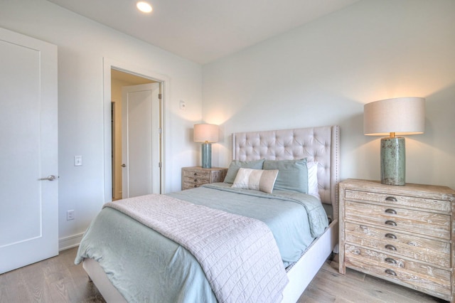 bedroom featuring light hardwood / wood-style flooring