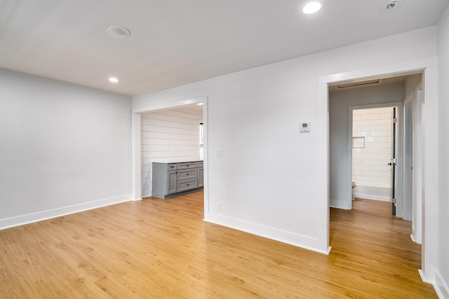 unfurnished room featuring light wood-type flooring