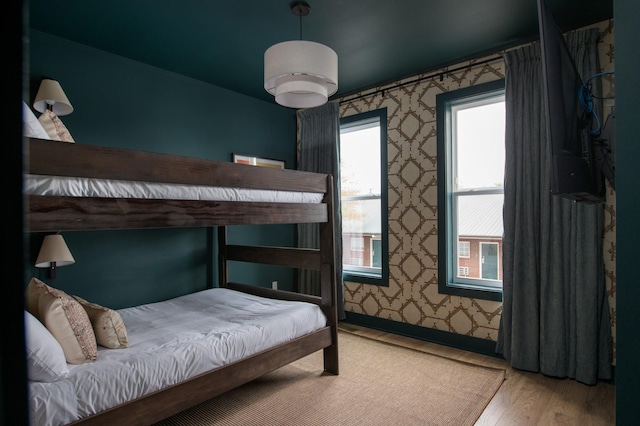 bedroom featuring hardwood / wood-style floors