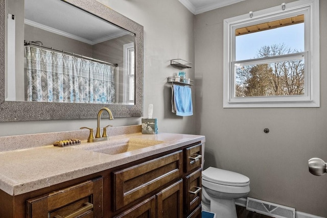 bathroom featuring a shower with shower curtain, vanity, toilet, and ornamental molding